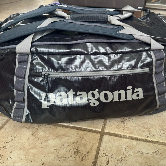 smolder blue patagonia duffel 40L Black Hole consumer recycled polyester ripstop with a matte Patagonia 70L Black Hole Duffel